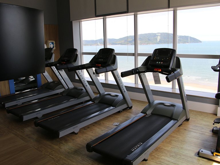 Studio aconchegante com varanda vista mar