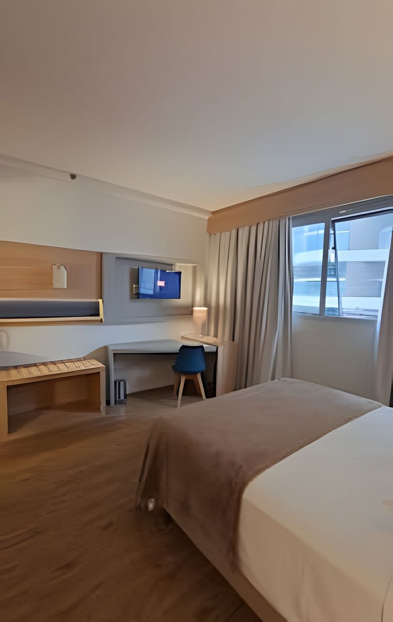 Flat a apenas 1 minuto da praia em Santos-SP