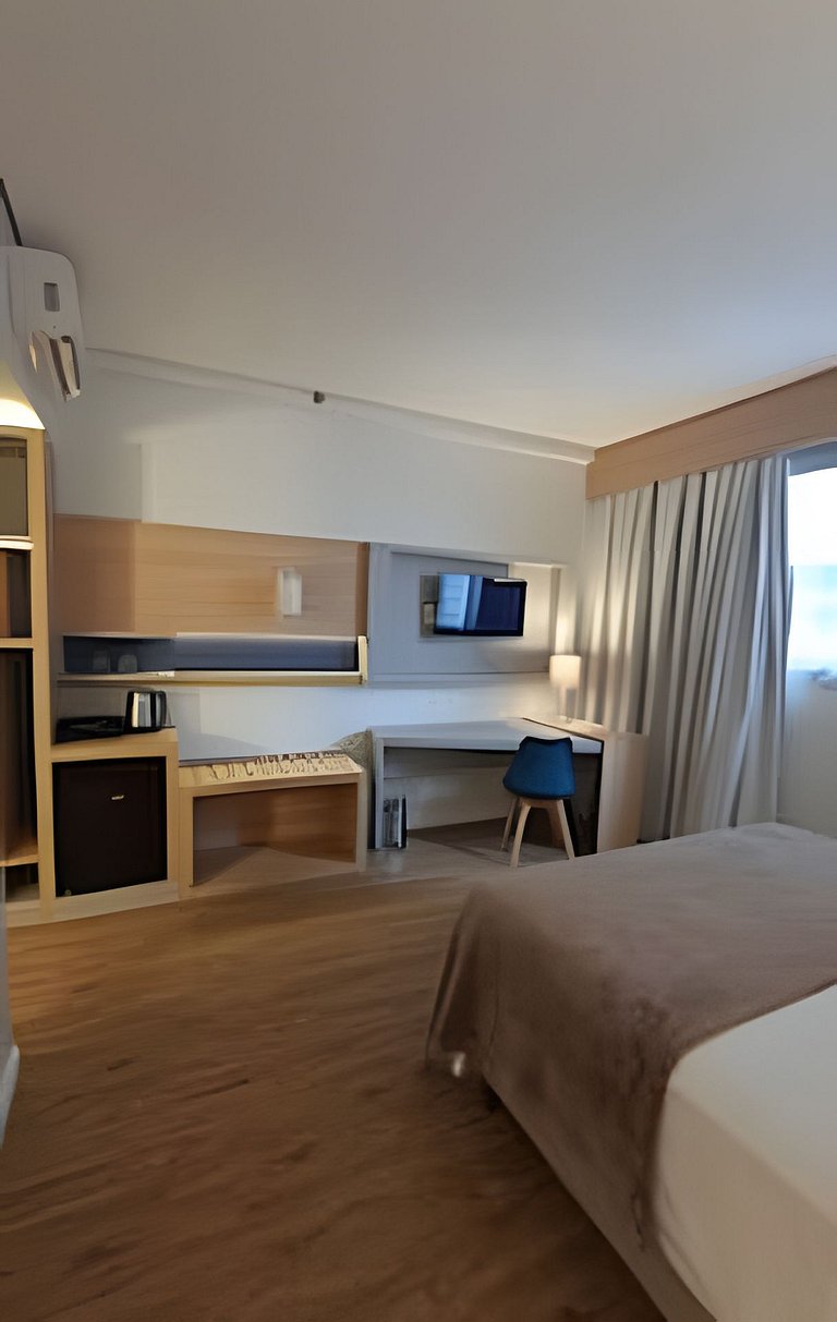 Flat a apenas 1 minuto da praia em Santos-SP