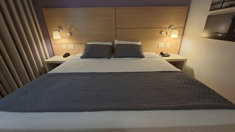 Flat com cama king a 50m da praia de Santos