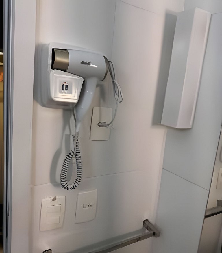 Flat na quadra da praia com cama queen!