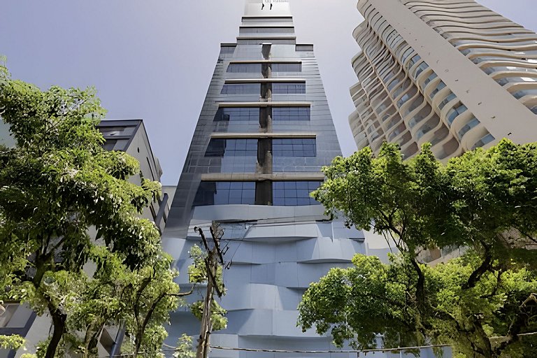 Flat na quadra da praia com cama king!