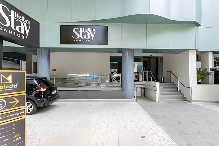 Flat na quadra da praia com cama queen!