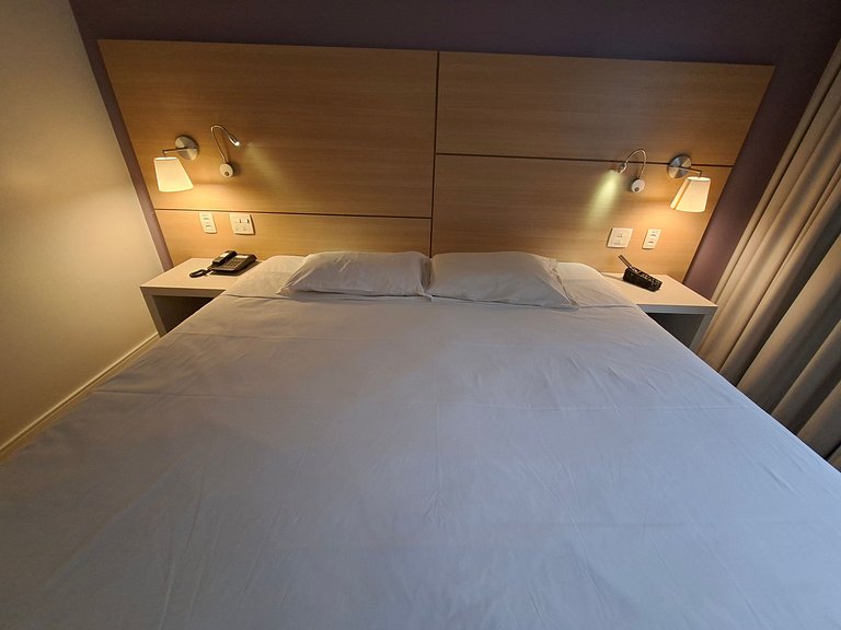 Flat com cama King na praia de Santos