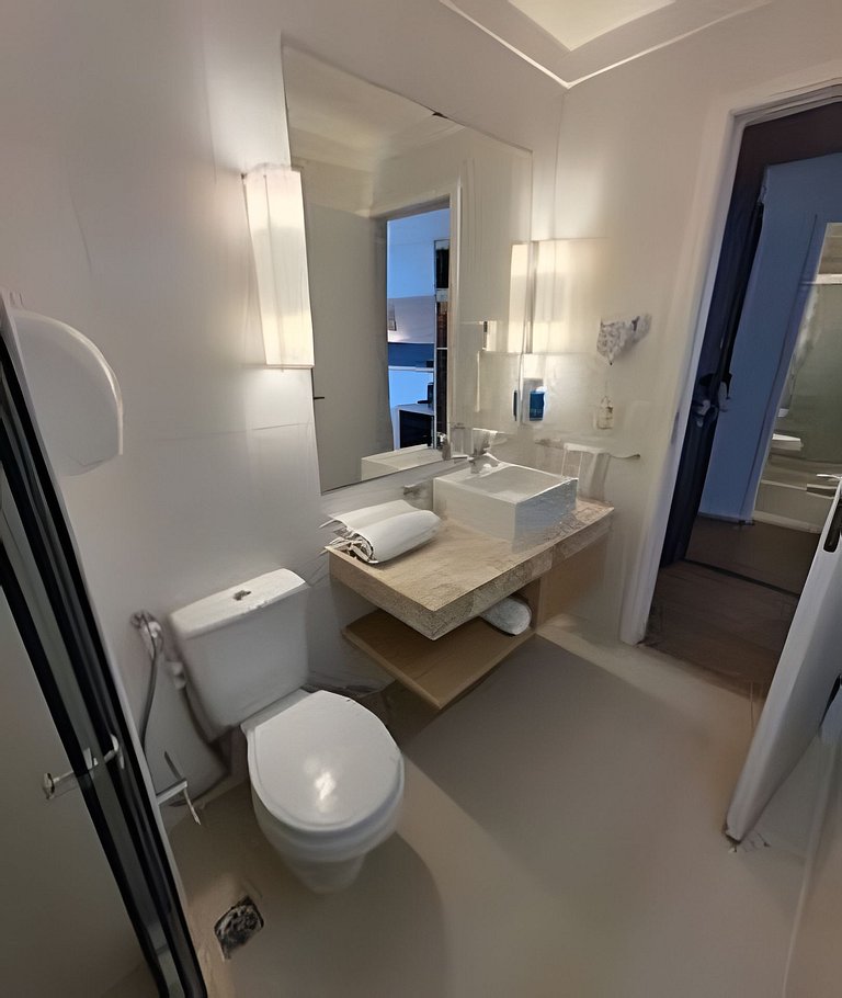 Flat com varanda e vista mar em Santos