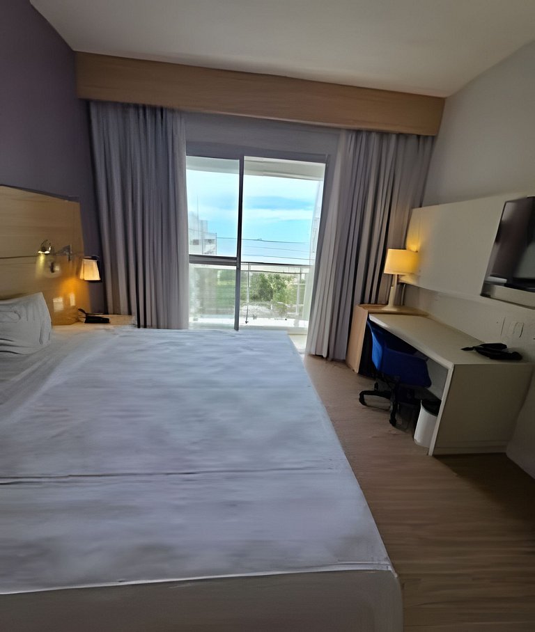 Flat com varanda e vista mar em Santos