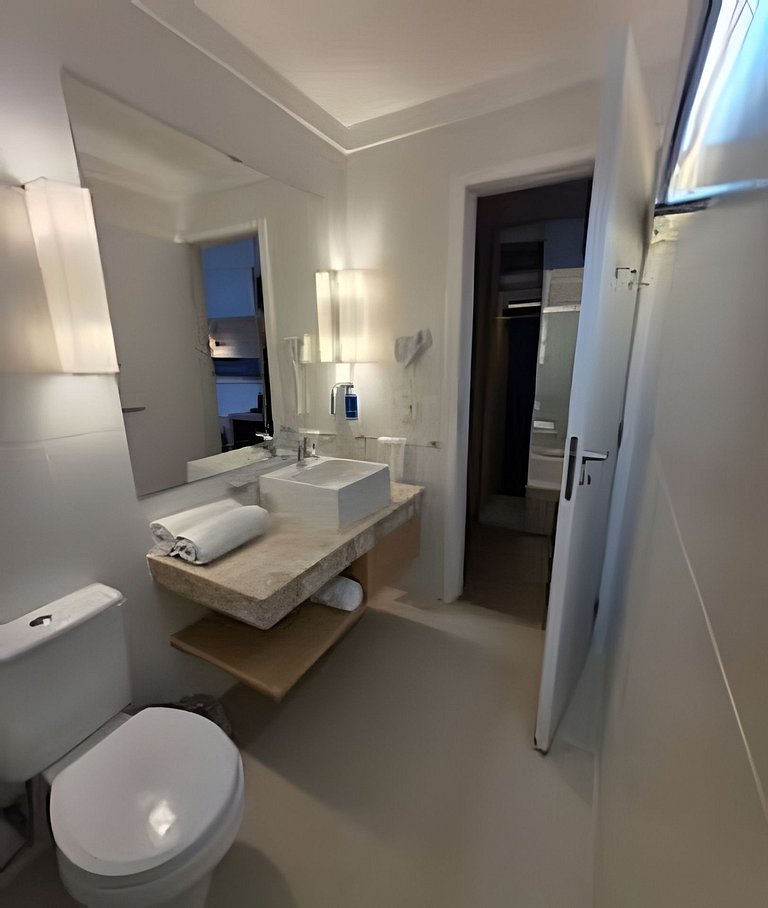 Flat com varanda e vista mar em Santos