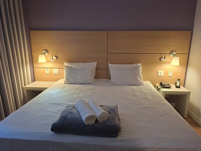 Studio com cama King 50m da praia