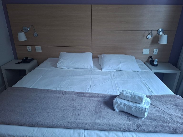 Flat com cama King na praia de Santos